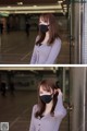 A woman wearing a black face mask in an airport.